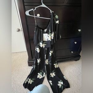 Fabrik one shoulder floral jumpsuit.